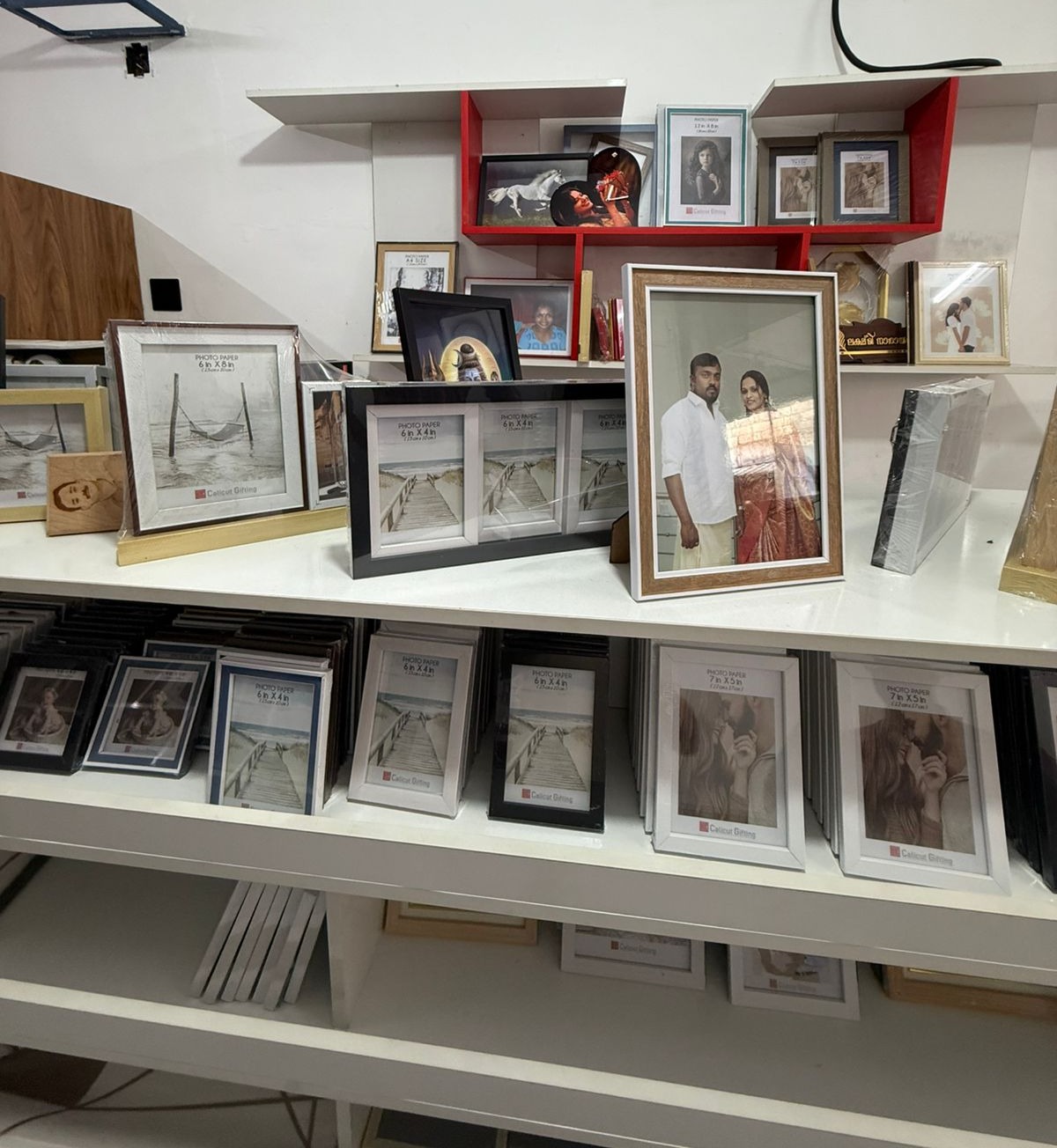 Photo frames  and gifts wholesale and reatail vadakara : Maya Frames and Gifts