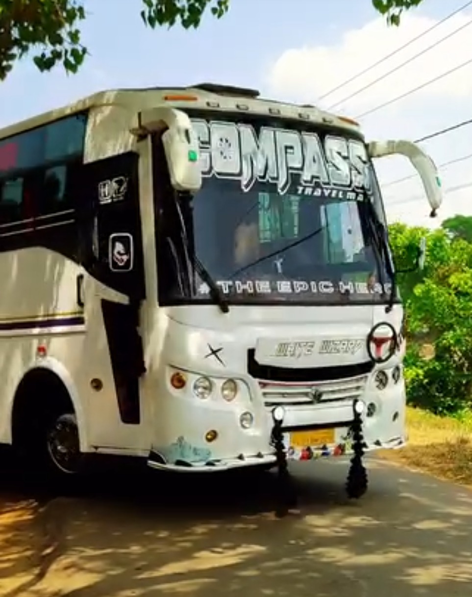 Tourist bus in wayanad Kalpetta, traveller in wayanad Kalpetta, Compass Travelmate