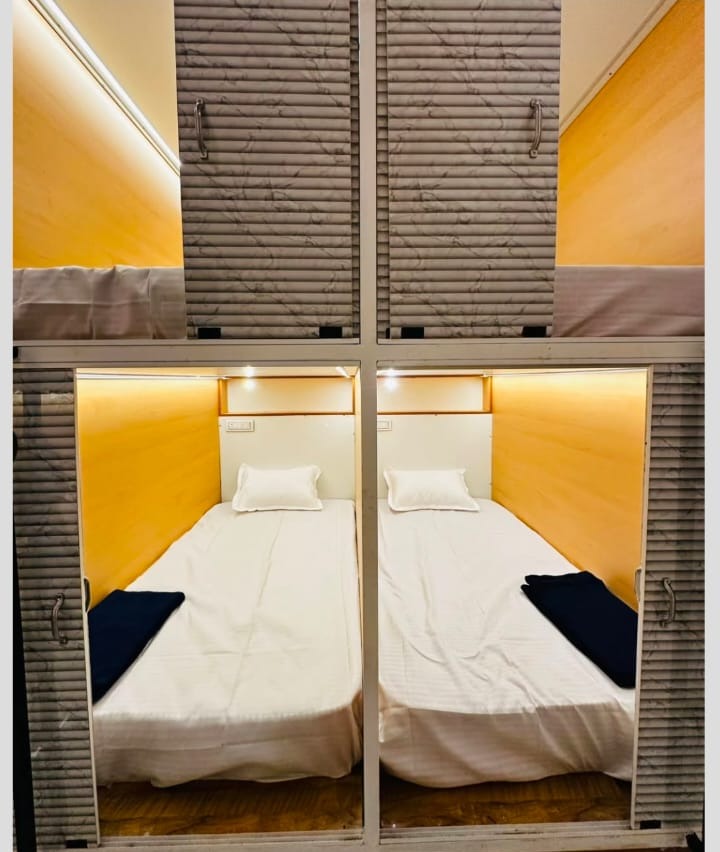 Dormitories in Calicut, Rooms in Calict, Capsule pods in Calicut,Hotel in Calicut,t,Lowfare Hotels Calicut