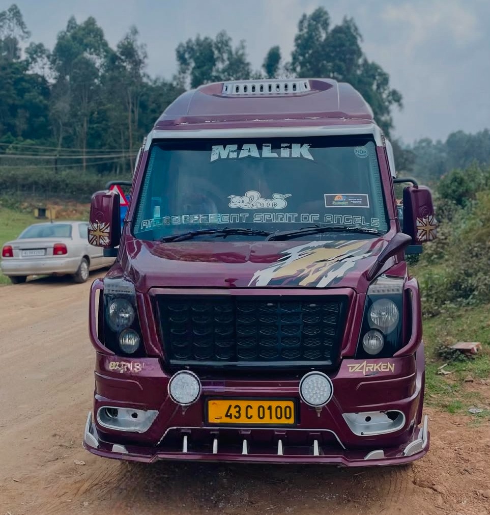 Tourist bus service Mankurussi Parali Palakkad, Traveller service Mankurussi Parali Palakkad, Malik Holicab 