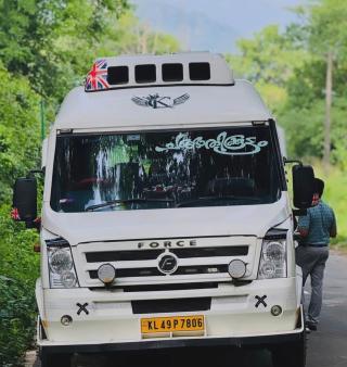 Tourist bus Service  Nenmara palakkad , Traveller service Nenmara palakkad , Bus tour agency  Nenmara palakkad , ​Changathikootam Holidays