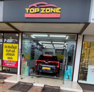 Car window films shop in kottukara kondotty,Car cooling film in kottukara kondotty,Car window films installation in kottukara kondotty,Top Zone Car window film 