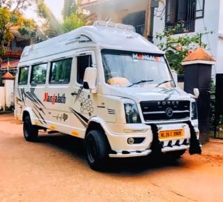 Traveller service in punalur kunnikode,Traveller booking in  punalur kunnikode kollam, Mangalath Travel Hub 
