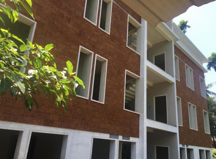 Red laterite tile in kannur kerala ,Laterite wall cladding stone tile in kannur kerala , Natural cladding stone tile in kannur kerala , Chenkal tile in kannur kerala , Stoneage Laterite Tiles